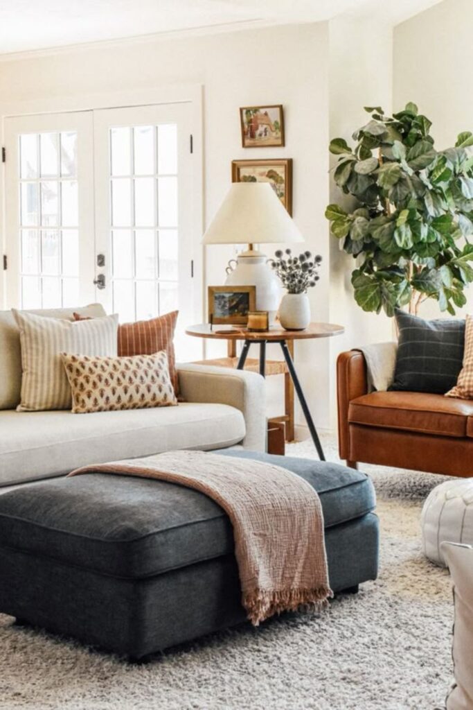 23+ Living Room Ideas That Actually Make Small Spaces Feel Bigger 12 Add Texture Through Throw Pillows and Layered Textiles Not More Furniture